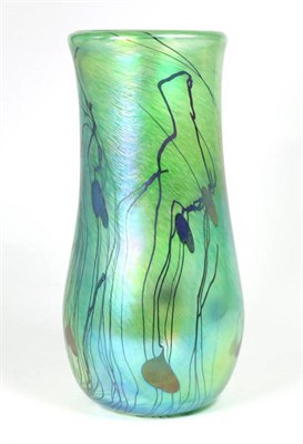 Lot 34 - John Ditchfield for Glasform; an iridescent green vase decorated with trails and pearl drops,...