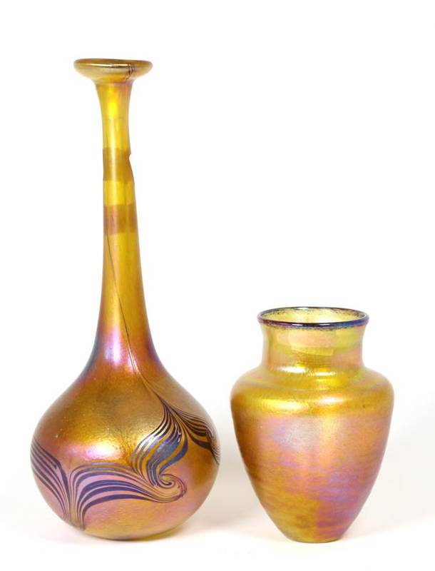 Lot 43 - John Ditchfield for Glasform; an iridescent gold bottle vase decorated with feathering 31cms etched