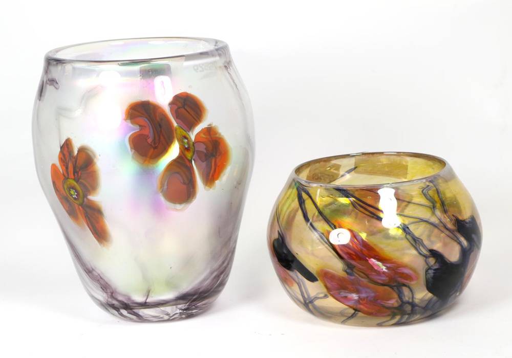 Lot 44 - John Ditchfield for Glasform; an iridescent clear vase with petroleum tint, millefiori flower...