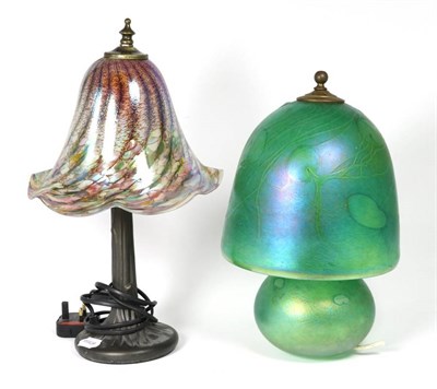 Lot 46 - John Ditchfield for Glasform; an iridescent green glass table lamp decorated with lily pads and...