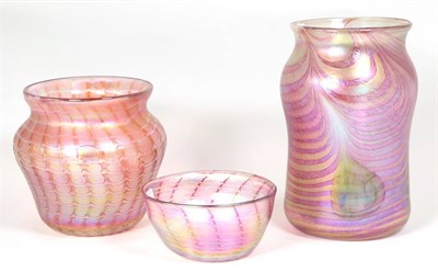 Lot 107 - John Ditchfield for Glasform; an iridescent pink vase decorated with feathered bands and pearl...