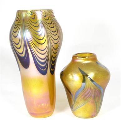 Lot 108 - John Ditchfield for Glasform; an iridescent gold vase decorated with feathered bands, etched to...