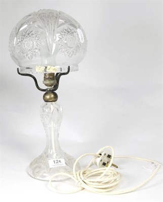 Lot 124 - An early 20th century crystal glass lamp of mushroom form with baluster stem