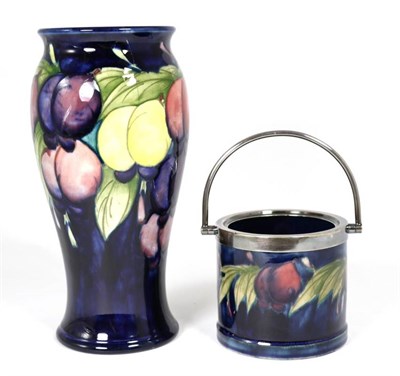 Lot 135 - Moorcroft Pottery: a Wisteria pattern vase and a Wisteria pattern condiment jar (cover lacking) (2)