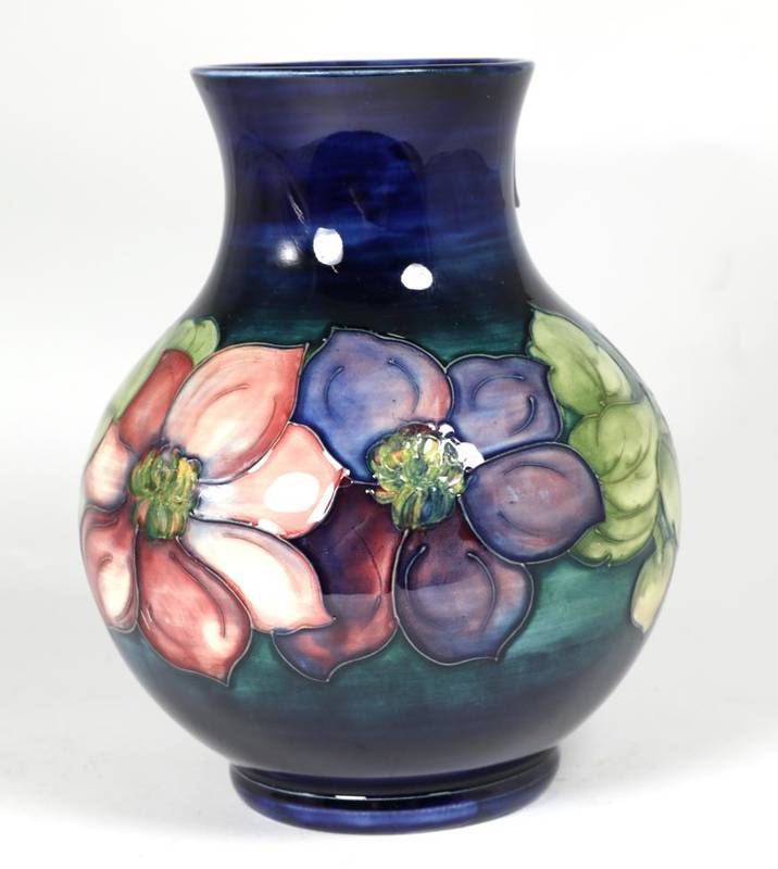 Lot 141 - Moorcroft Pottery: a Clematis pattern vase,