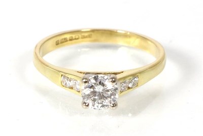 Lot 166 - An 18 carat gold solitaire diamond ring, a round brilliant cut diamond in a claw setting, to...