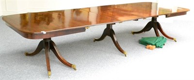 Lot 1168 - A Late George III Mahogany Scissor-Action Extending Dining Table, early 19th century,...