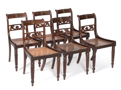 Lot 1169 - A Set of Six Regency Rosewood and Cane Seated Music Room Chairs, early 19th century, the curved top