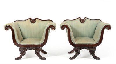 Lot 1177 - A Pair of Carved Mahogany Armchairs, late 19th century, upholstered in stripped green fabric...