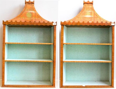 Lot 1187 - A Pair of Satinwood and Green Painted Pagoda Top Cabinets, painted with ribbon tied motifs,...