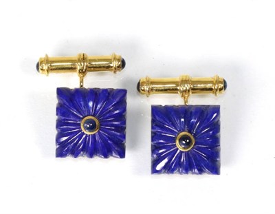 Lot 257 - A pair of gilt metal lapis lazuli and sapphire cufflinks, a round cabochon sapphire in a rubbed...