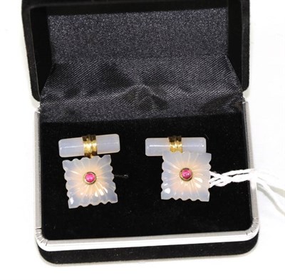 Lot 266 - A pair of gilt metal chalcedony and ruby cufflinks, a round cabochon ruby in a rubbed over setting