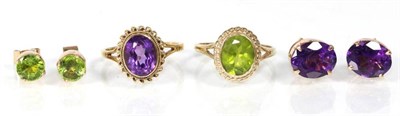 Lot 268 - A 9 carat gold peridot ring, an oval cut peridot in a rope frame, finger size O1/2 and a pair...