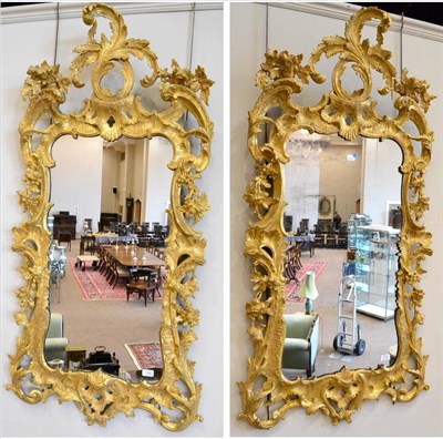 Lot 1195 - A Pair of George III Carved Giltwood Mirrors, 3rd quarter 19th century, the shaped rectangular...