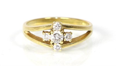 Lot 278 - A diamond cluster ring, a round brilliant cut diamond within a border of four smaller diamonds,...