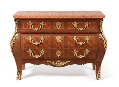 Lot 1217 - A Bois Satine, Tulipwood and Parquetry Decorated Régence Style Commode, late 19th century,...