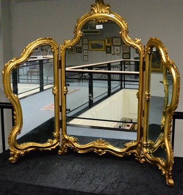 Lot 1218 - A Louis XV Style Carved Giltwood and Gesso Triptych Dressing Table Mirror, late 19th/early 20th...