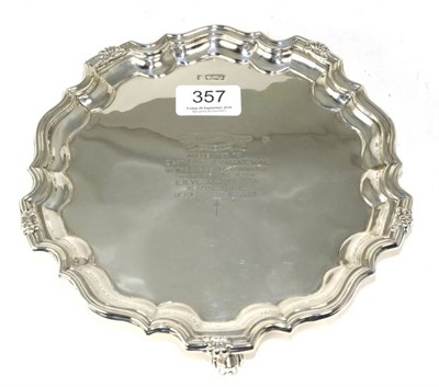 Lot 357 - A late Victorian shaped circular silver salver, James Deakin & Sons, Sheffield 1897, engraved...