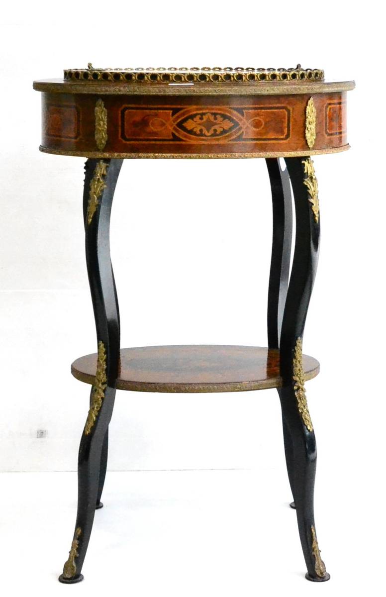 Lot 1225 - A Louis XVI Style Burr Walnut, Ebonised and Marquetry Decorated Jardinière Table, late 19th...