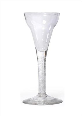 Lot 12 - A Wine Glass, circa 1750, the pan topped bowl on an opaque twist stem, 17.2cm high See illustration