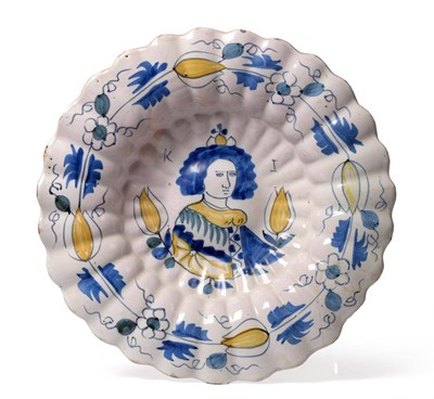 Lot 59 - A Dutch Delft Royal Portrait Dish, circa 1690, painted in colours with a bust portrait of Queen...