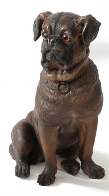 Lot 83 - An Austrian Painted Terracotta Figure of a Pug, circa 1900, seated, with glass eyes and brown...