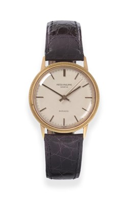 Lot 180 - A Good 18ct Gold Automatic Centre Seconds Wristwatch, signed Patek Philippe, Geneve, retailed...