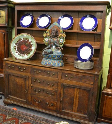 Lot 1247 - A George III oak dresser and rack