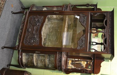 Lot 1249 - A late 19th/early 20th century carved mahogany display cabinet