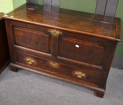 Lot 1251 - An 18th century oak mule chest, hinged lid, double-panel over long drawer