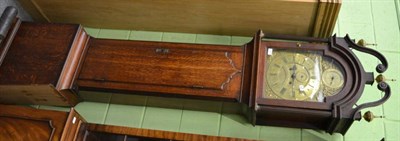 Lot 1257 - An oak eight day longcase clock, arched brass dial inscribed R Henderson, Scarborough, later case