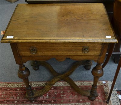 Lot 1262 - An oak lowboy