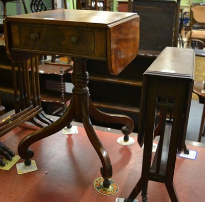 Lot 1263 - A mahogany drop leaf pedestal occasional table together with a mahogany Sutherland table