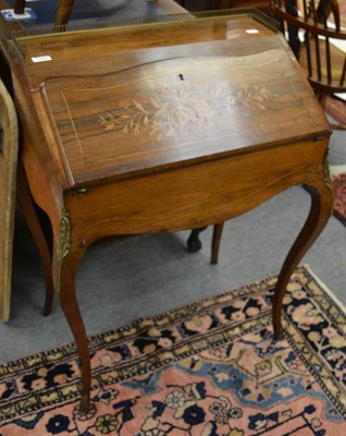 Lot 1282 - A French inlaid rosewood ormolu mounted bureau de dame