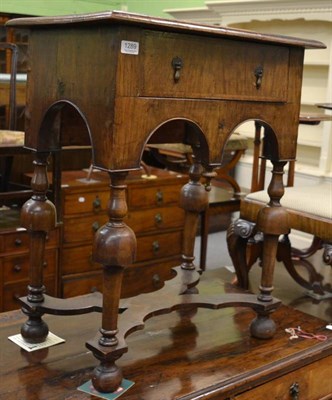 Lot 1289 - An 18th century feather banded walnut side table fitted with a drawer, the turned legs joined...