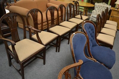 Lot 1301 - A set of ten mahogany dining chairs including two carvers