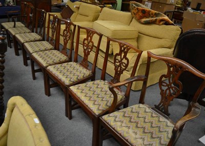 Lot 1329 - A set of eight mahogany dining chairs including two carvers, each with carved and pierced slats and