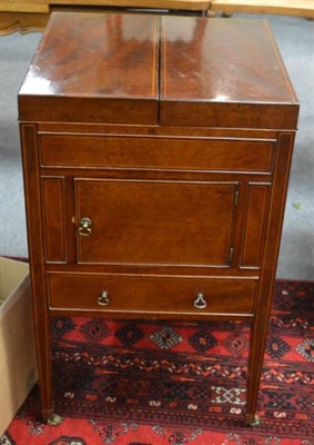 Lot 1332 - An inlaid mahogany washstand, the hinged covers opening to reveal a pop up mirror