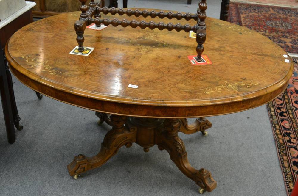 Lot 1334 - A Victorian walnut breakfast table