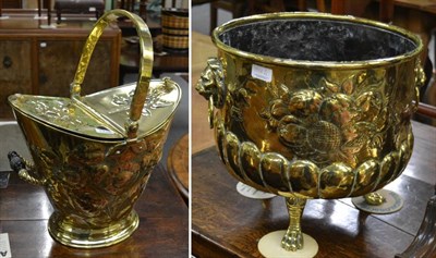 Lot 1336 - A late 19th/early 20th century brass coal bucket with swing handle and turned wooden side...