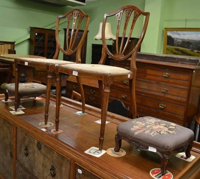 Lot 1347 - A pair of Edwardian Sheraton-Revival shield back salon chairs, with satinwood inlay; together...