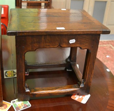 Lot 1354 - A reproduction oak stool