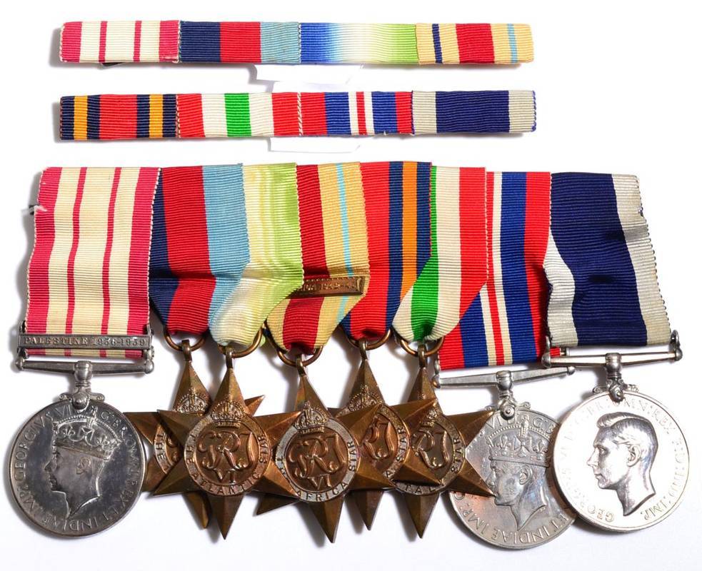Lot 4 - A Second World War Naval Long Service Group of Eight Medals, awarded to MX.47355 S.J.LAST....