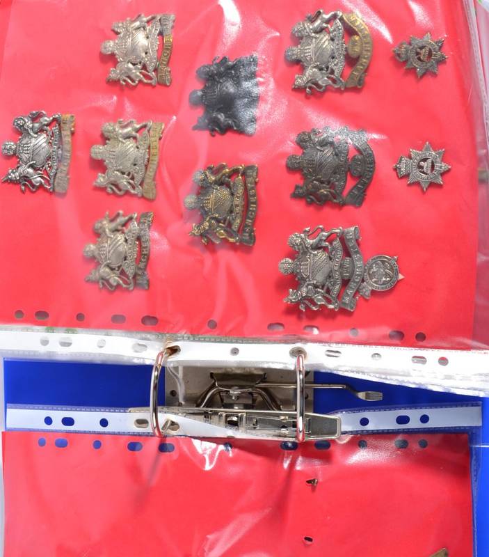 Lot 75 - The Manchester Regiment:- a Collection of Metal Badges and Cloth Insignia, including a...