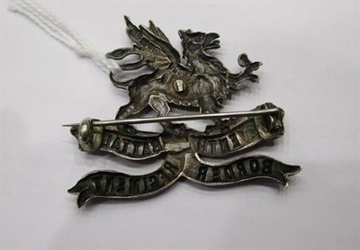 Lot 77 - A Rare First World War Silver Cap Badge to Eleventh Battalion Border Regiment, now brooched,...