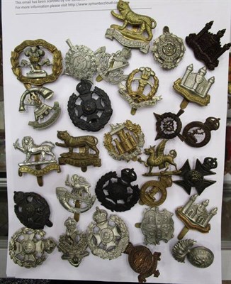 Lot 97 - A Collection of Twenty Eight Territorial Army Cap Badges, in brass, white metal, bimetal, blackened