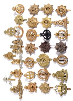 Lot 98 - A Collection of Thirty One Army Corps Cap Badges, in brass, bimetal, and bronze, including...