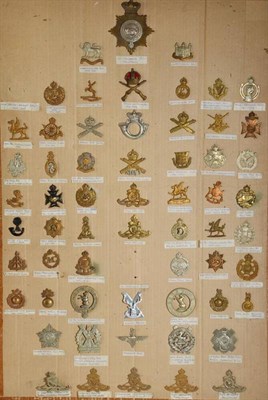 Lot 104 - A Collection of Sixty Cap and Glengarry Badges, including a two part bi-metal helmet plate to...