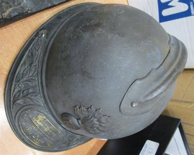 Lot 181 - A First World War French M15 Adrian Helmet, with shallow raised comb and helmet plate of a...