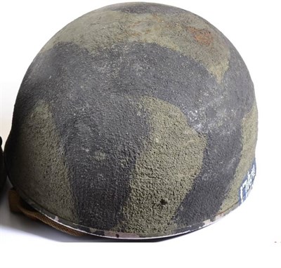 Lot 184 - A Second World War British D-Day Mk.2 Paratrooper's Helmet by BMB, with camouflage paint, the...